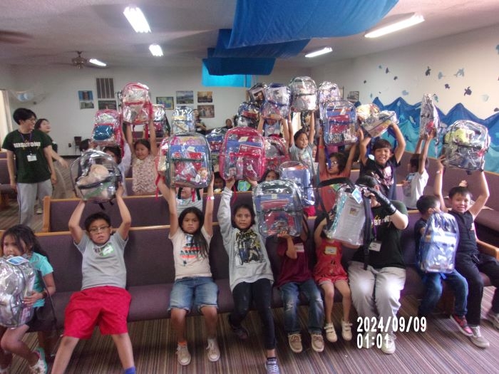 Youth Receiving Backpacks at Our July, 2024 VBS Program