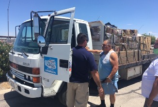 Donation of a Flat Bed Delivery Truck 